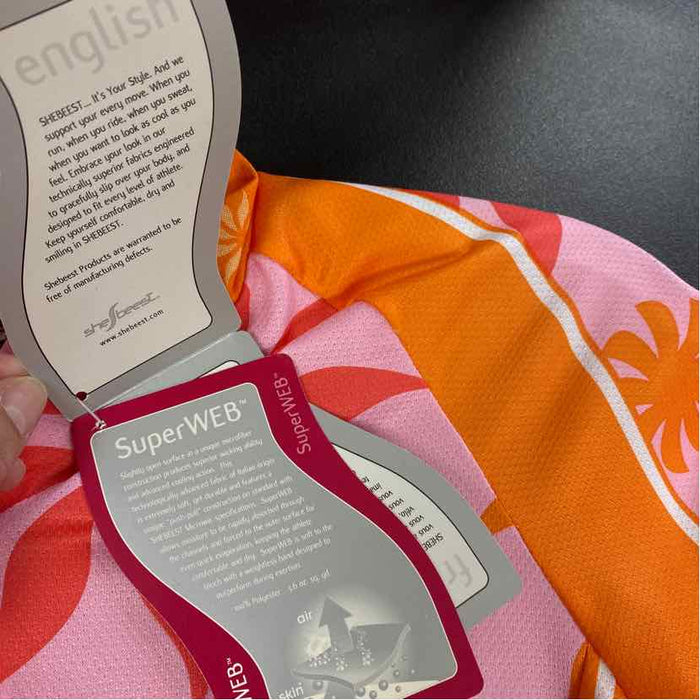 Shebeest Size XS Women's Orange-Pink Pattern Short Sleeve Activewear Top