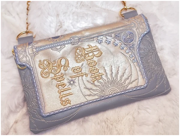 TopZip Flap Bag - Book of Spells