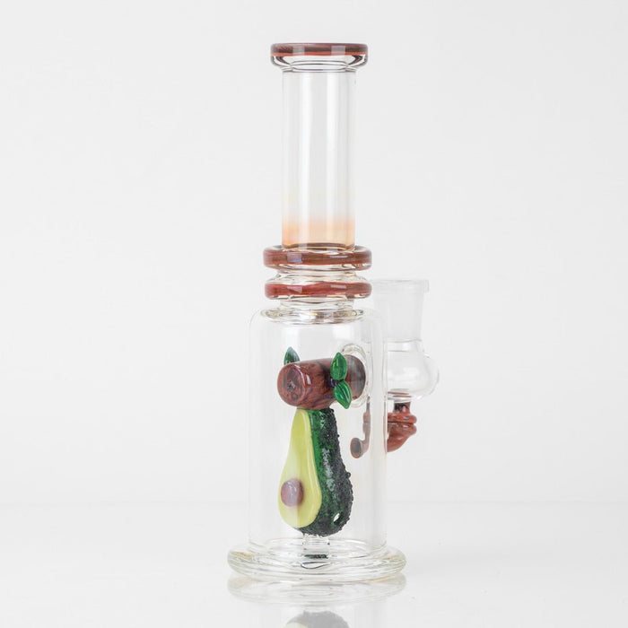 Collectible avocado mini dab rig with detailed figurine work and clear chamber